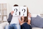 couple on couch with questions